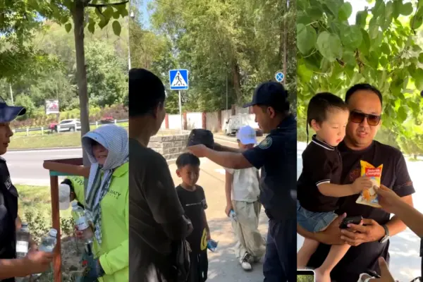 Алматы полицейлері ыстықта қала тұрғындарына су, панама және балмұздақ таратуда